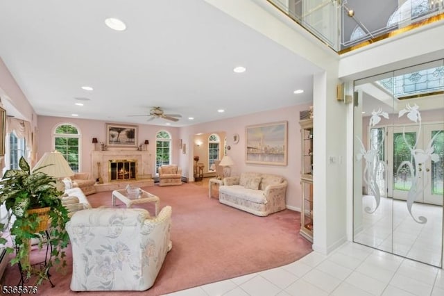 1503 Woodacres Dr, Mountainside Boro, NJ 07092 - carpeted living room with tile patterned floors, recessed lighting, a ceiling fan, and a glass covered fireplace
