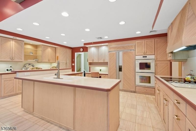 1503 Woodacres Dr, Mountainside Boro, NJ 07092 - kitchen with double oven, paneled fridge, light countertops, premium range hood, and light brown cabinets