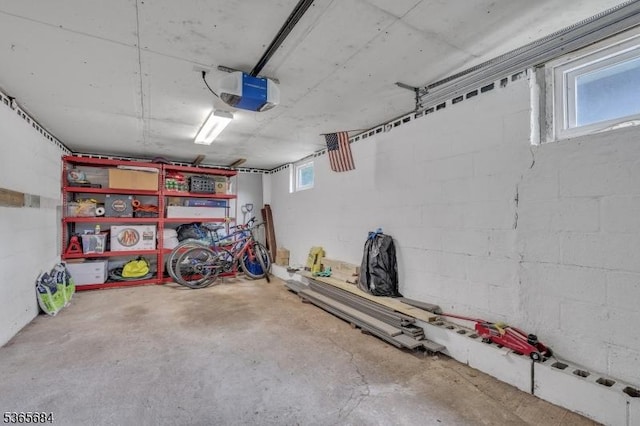 16 Ridgewood Pkwy W, Denville Twp, NJ 07834 - garage with a garage door opener and concrete block wall