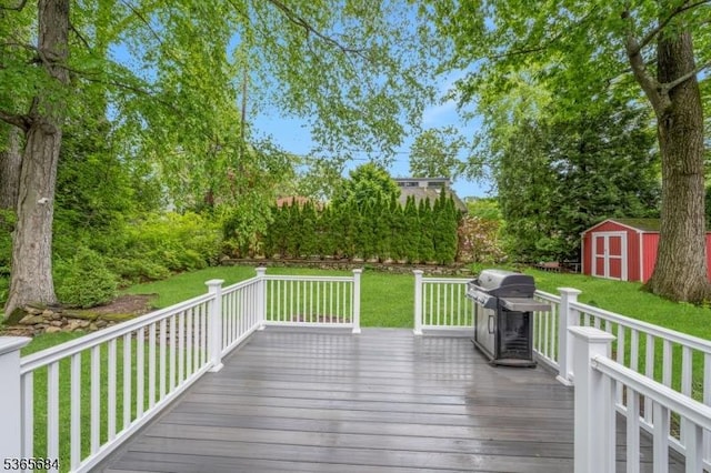 16 Ridgewood Pkwy W, Denville Twp, NJ 07834 - deck featuring area for grilling, a storage shed, and a yard