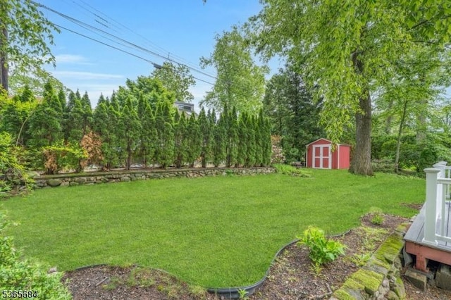 16 Ridgewood Pkwy W, Denville Twp, NJ 07834 - view of green lawn with a storage shed