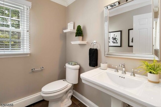 6 Wyckoff Way, Morris Plains Boro, NJ 07950 - half bath featuring baseboard heating, plenty of natural light, tile patterned floors, and crown molding