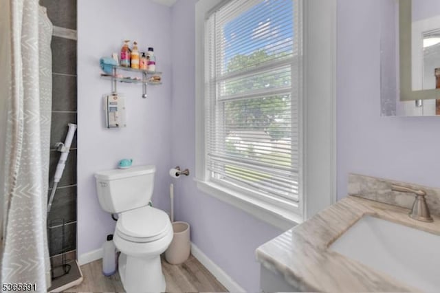 23 Brookside Ave, Hawthorne Boro, NJ 07506 - full bathroom featuring wood finished floors, vanity, and curtained shower