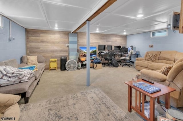 23 Brookside Ave, Hawthorne Boro, NJ 07506 - living area featuring wood walls, concrete block wall, and carpet flooring