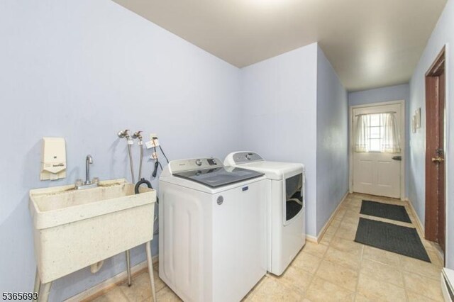 9 Andrea Ter, East Hanover Twp, NJ 07936 - laundry room with washing machine and dryer and light tile patterned flooring