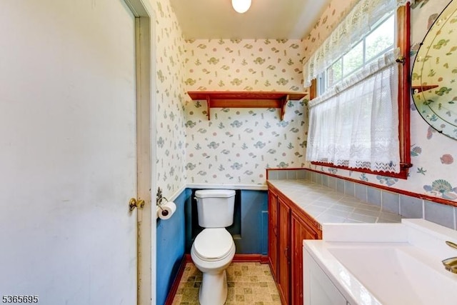 508 Stony Brook Dr, Bridgewater Twp, NJ 08807 - bathroom with wallpapered walls and vanity