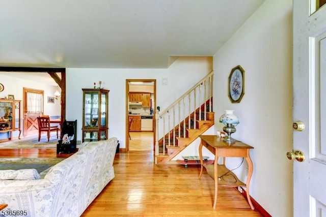 508 Stony Brook Dr, Bridgewater Twp, NJ 08807 - living area with stairway and light wood-style floors