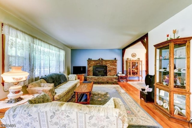 508 Stony Brook Dr, Bridgewater Twp, NJ 08807 - living area featuring wood finished floors and a fireplace