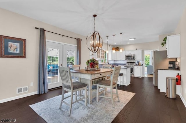 6 White Rd, Raritan Twp, NJ 08822 - dining area with dark wood finished floors, french doors, a chandelier, and recessed lighting