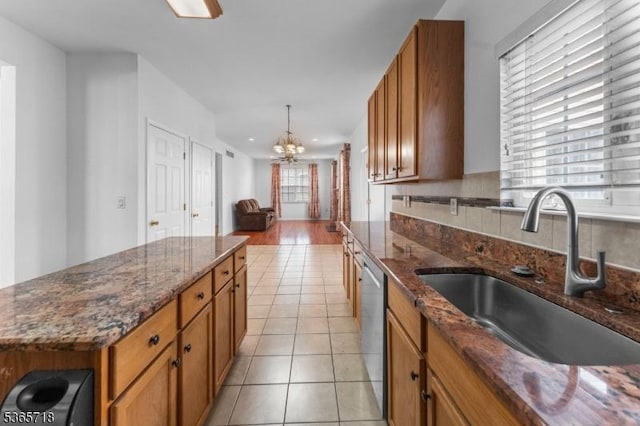 8 Cobblers Cir, Franklin Twp, NJ 08823 - kitchen with brown cabinets, dishwasher, light tile patterned floors, a chandelier, and recessed lighting