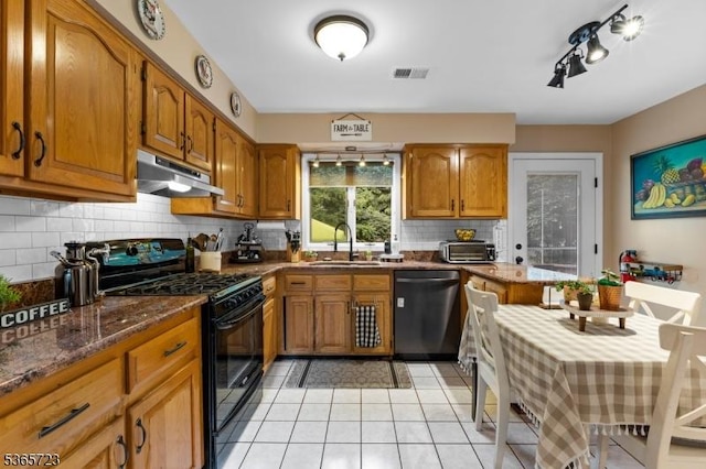 825 Odonnell Ave, Scotch Plains Twp, NJ 07076 - kitchen featuring stainless steel dishwasher, black gas stove, under cabinet range hood, and brown cabinetry
