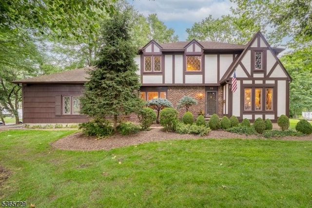73 Garden Ave, Chatham Boro, NJ 07928 - back of house with a lawn, stucco siding, and a shingled roof