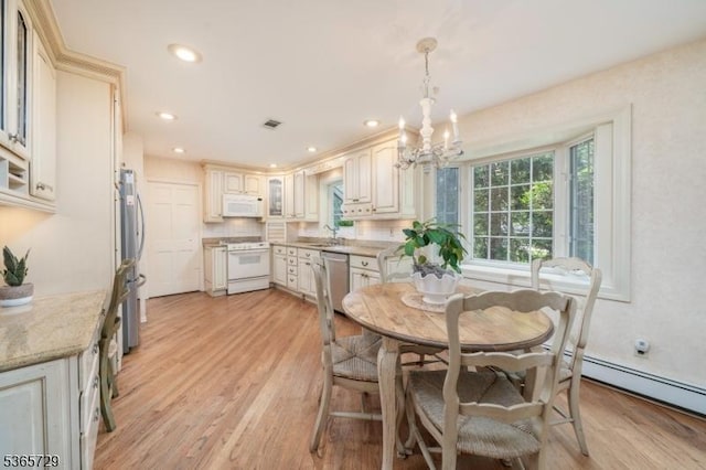 73 Garden Ave, Chatham Boro, NJ 07928 - dining area with a chandelier, light wood-style flooring, and recessed lighting