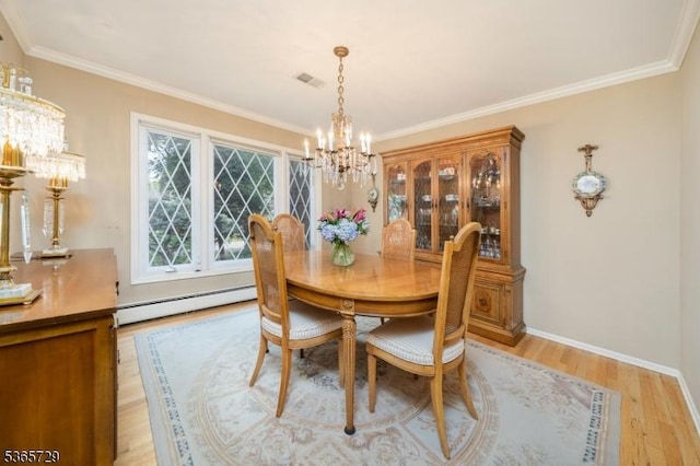 73 Garden Ave, Chatham Boro, NJ 07928 - dining space featuring a chandelier, baseboard heating, light wood-style flooring, and crown molding