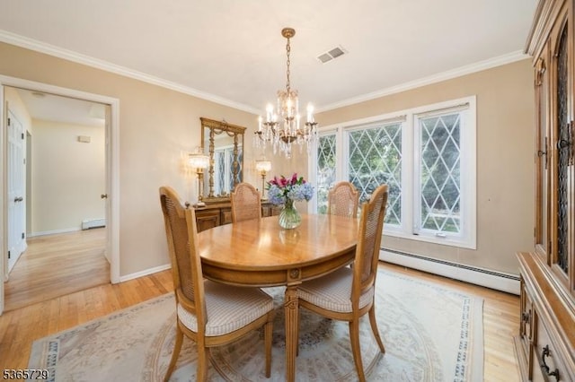 73 Garden Ave, Chatham Boro, NJ 07928 - dining room featuring a baseboard radiator, a chandelier, light wood-style flooring, and crown molding