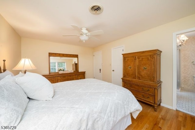 73 Garden Ave, Chatham Boro, NJ 07928 - bedroom with light wood-style flooring, a ceiling fan, and ensuite bath