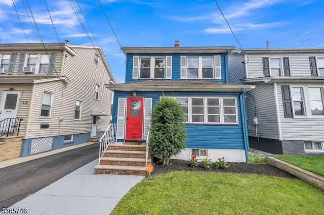 522 Locust Ave, Hillside Twp, NJ 07205 - view of front of house with entry steps and a chimney
