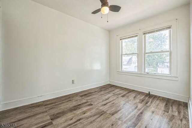 522 Locust Ave, Hillside Twp, NJ 07205 - spare room with wood finished floors and a ceiling fan