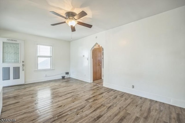 522 Locust Ave, Hillside Twp, NJ 07205 - unfurnished room with ceiling fan, wood finished floors, and arched walkways