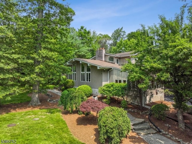 11 Rising Ridge Rd, Upper Saddle River Boro, NJ 07458 - view of property exterior featuring a chimney