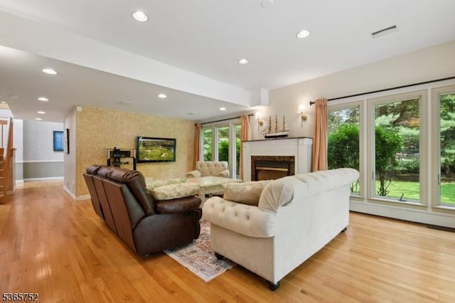 11 Rising Ridge Rd, Upper Saddle River Boro, NJ 07458 - living area with a fireplace, light wood-style flooring, and recessed lighting