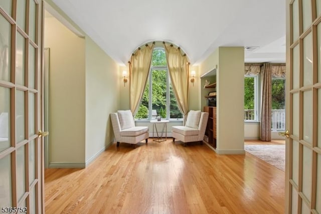 11 Rising Ridge Rd, Upper Saddle River Boro, NJ 07458 - sitting room featuring wood finished floors, lofted ceiling, and french doors