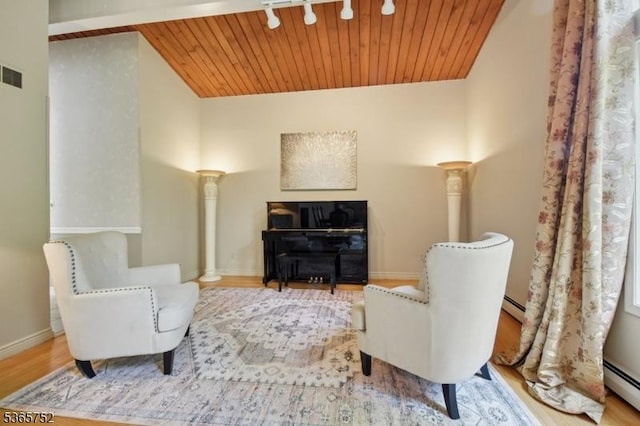 11 Rising Ridge Rd, Upper Saddle River Boro, NJ 07458 - sitting room featuring a baseboard radiator, wood finished floors, and wood ceiling