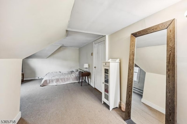 210 Baldwin St, Glen Ridge Boro Twp, NJ 07028 - carpeted bedroom with a baseboard heating unit and vaulted ceiling
