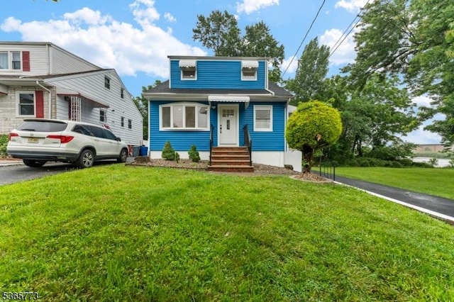 1837 Barnett St, Rahway City, NJ 07065 - view of front of house featuring a front lawn and entry steps