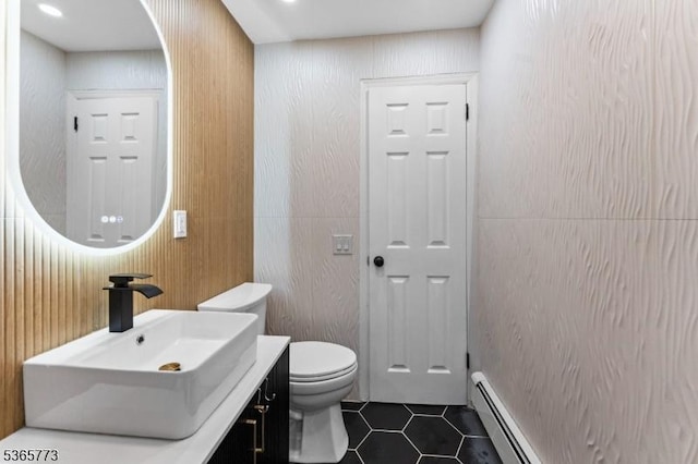 1837 Barnett St, Rahway City, NJ 07065 - bathroom featuring tile patterned floors, vanity, and a baseboard heating unit