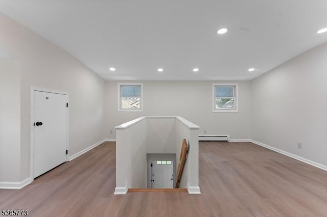 1837 Barnett St, Rahway City, NJ 07065 - spare room with wood finished floors, baseboard heating, and recessed lighting