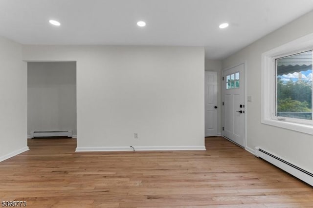 1837 Barnett St, Rahway City, NJ 07065 - entrance foyer featuring baseboard heating, light wood-style floors, and recessed lighting