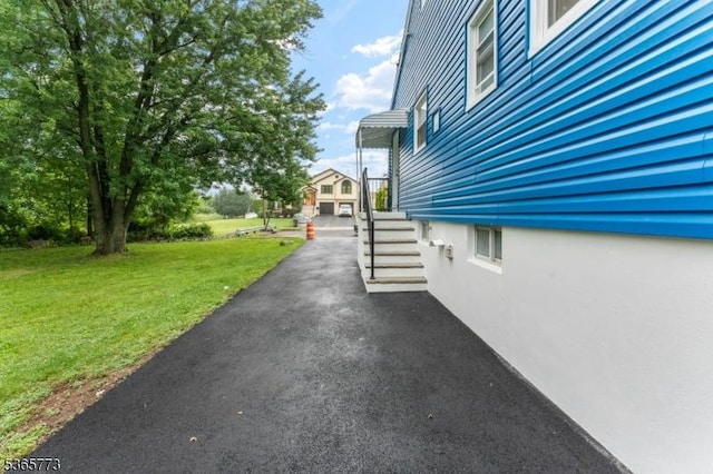 1837 Barnett St, Rahway City, NJ 07065 - view of side of home featuring a lawn