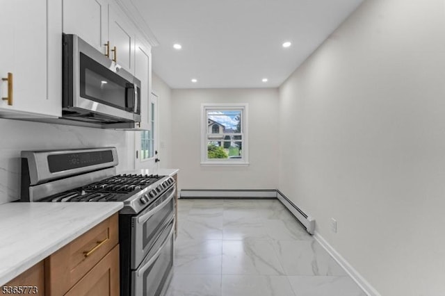 1837 Barnett St, Rahway City, NJ 07065 - kitchen with appliances with stainless steel finishes, light marble finish floors, baseboard heating, recessed lighting, and white cabinetry
