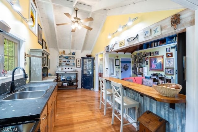 3 Maple Rd, Vernon Twp, NJ 07461 - kitchen with light wood-type flooring, ceiling fan, a kitchen bar, and stove