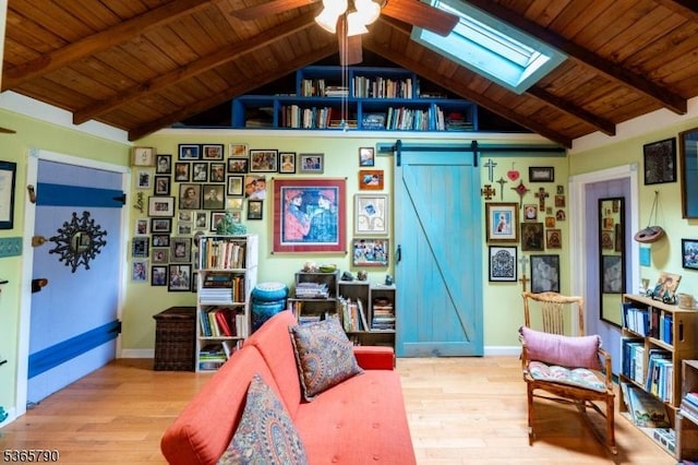 3 Maple Rd, Vernon Twp, NJ 07461 - living area with wood finished floors, wooden ceiling, a barn door, a ceiling fan, and a skylight
