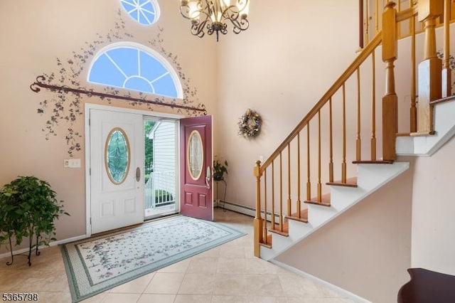 12 Autumn Dr, Mine Hill Twp, NJ 07803 - entryway with a baseboard radiator, a chandelier, stairway, a high ceiling, and tile patterned flooring