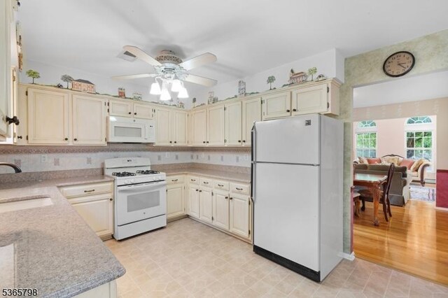 12 Autumn Dr, Mine Hill Twp, NJ 07803 - kitchen with white appliances, a ceiling fan, and cream cabinetry