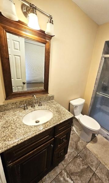 81 Stanwick Ct, Franklin Twp, NJ 08873 - bathroom with vanity, tile patterned floors, and a shower stall
