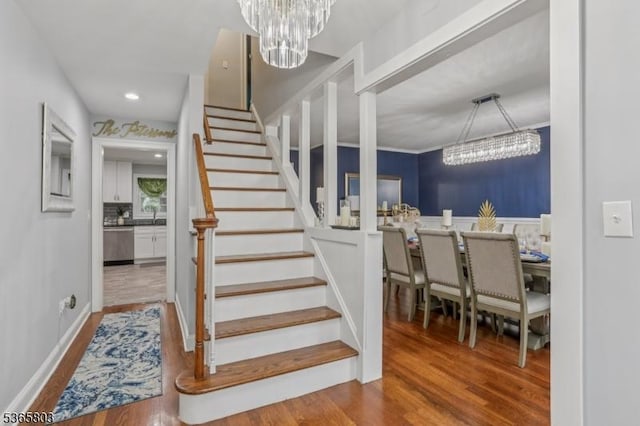 95 Harrison Ave, North Plainfield Boro, NJ 07060 - staircase with a chandelier, wood finished floors, and recessed lighting