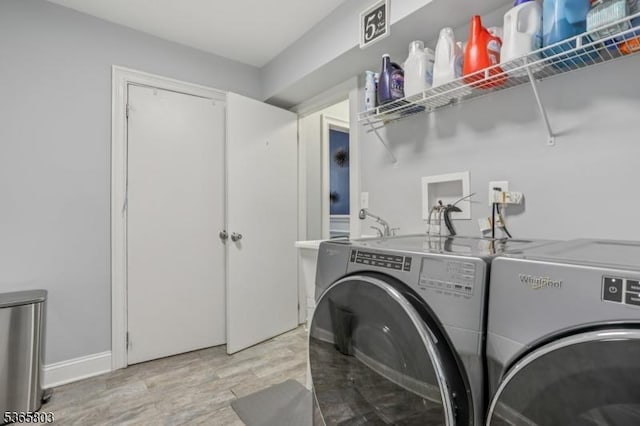 95 Harrison Ave, North Plainfield Boro, NJ 07060 - laundry room featuring independent washer and dryer and light wood-type flooring