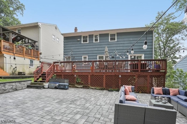 95 Harrison Ave, North Plainfield Boro, NJ 07060 - rear view of property with a patio, an outdoor hangout area, a deck, stairway, and a chimney