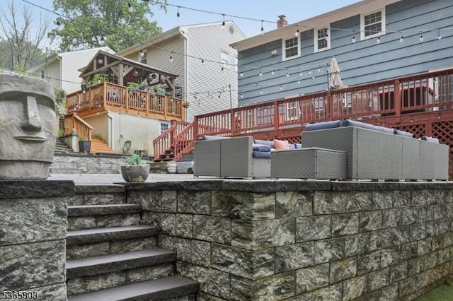 95 Harrison Ave, North Plainfield Boro, NJ 07060 - rear view of house with stairs, a deck, and an outdoor hangout area