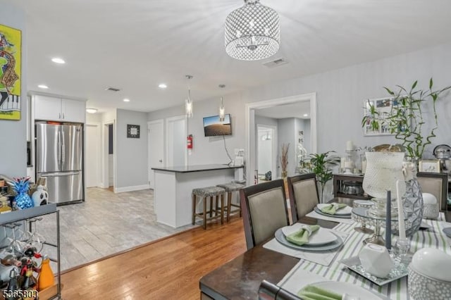 95 Harrison Ave, North Plainfield Boro, NJ 07060 - dining space featuring light wood finished floors, a chandelier, and recessed lighting