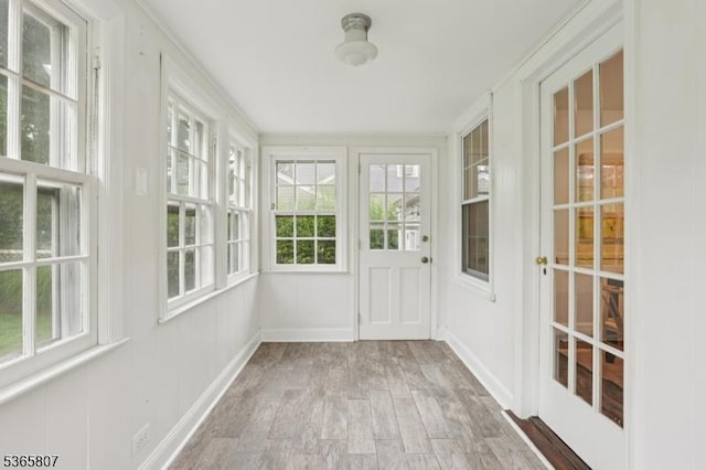 213 Columbia Ave, Cranford Twp, NJ 07016 - unfurnished sunroom featuring healthy amount of natural light, wood finished floors, and french doors