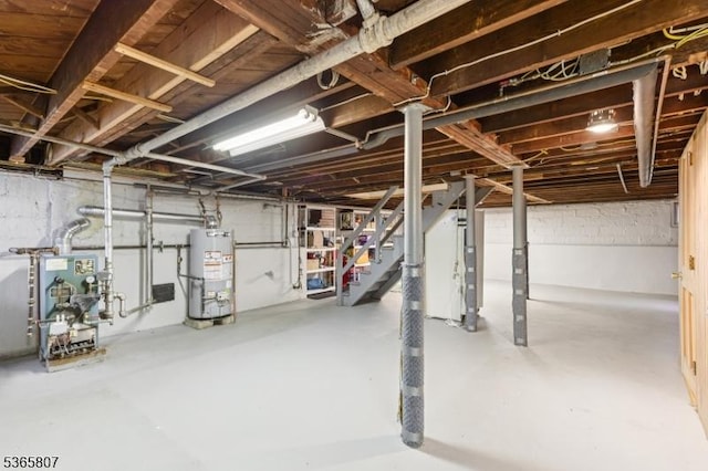 213 Columbia Ave, Cranford Twp, NJ 07016 - unfinished basement featuring secured water heater and stairs