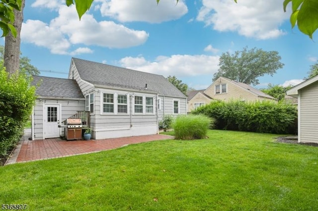 213 Columbia Ave, Cranford Twp, NJ 07016 - rear view of house featuring a patio area, a yard, and a shingled roof