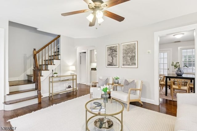 213 Columbia Ave, Cranford Twp, NJ 07016 - living area featuring wood finished floors, ceiling fan, stairway, and arched walkways