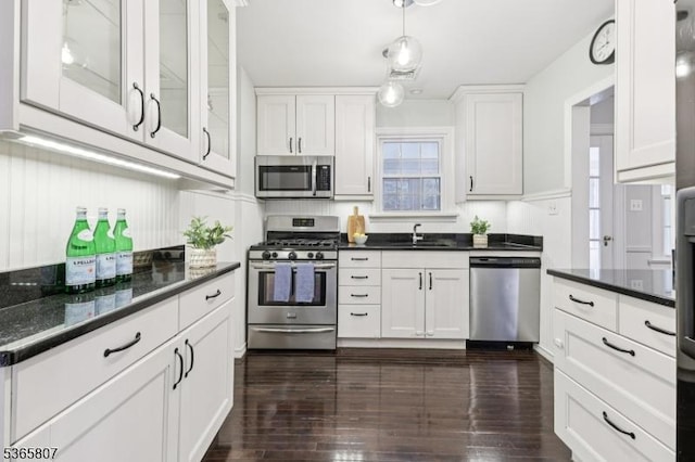 213 Columbia Ave, Cranford Twp, NJ 07016 - kitchen with stainless steel appliances, white cabinets, dark wood-style floors, and glass insert cabinets