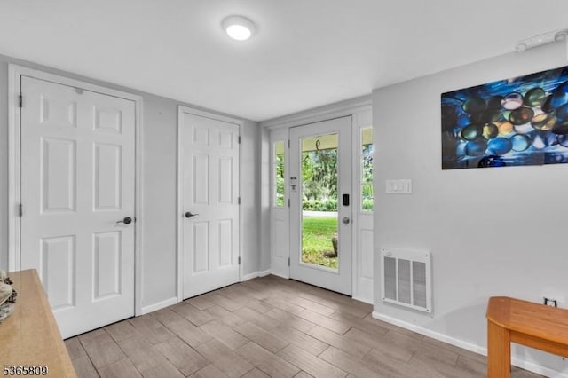 9 Mueller Ln, Franklin Twp, NJ 07882 - foyer with light wood finished floors and baseboards